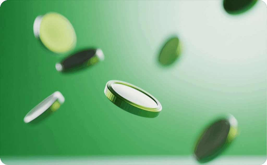 Golden coins on green background