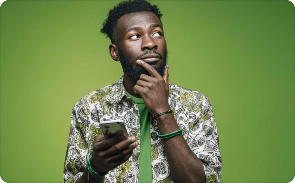 Man in green t-shirt on green background